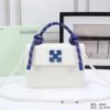 Off-White Leather Insert Gummy white with Metallic Blue Arrows At Front. Rope Handle Jitney 1.4 Shoulder Bag (D88532 White)