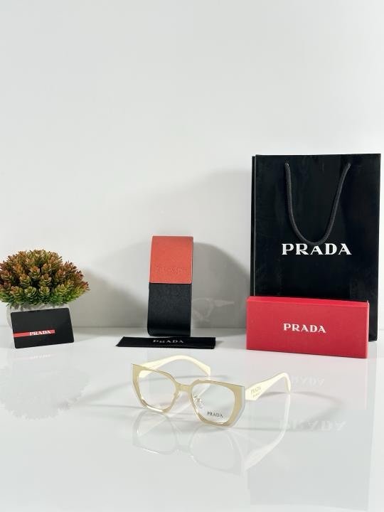 Prada WMNS 018 
Gold Cream Frame